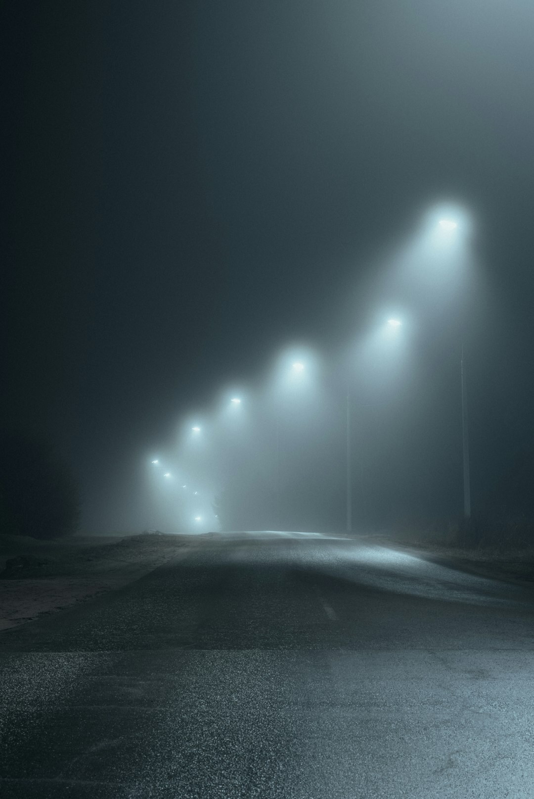 foggy city street at night